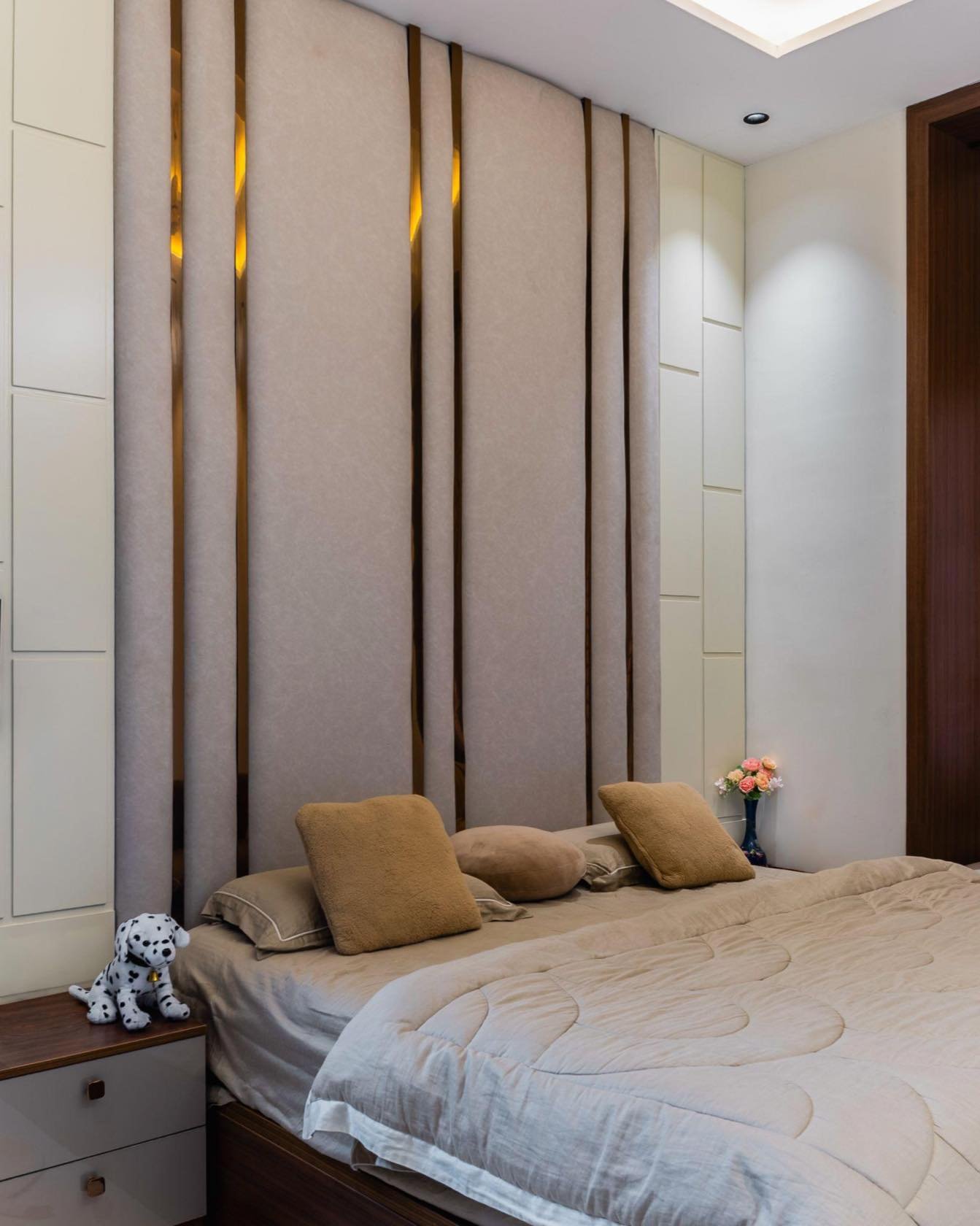 Bedroom with vertical fluted wall panels
