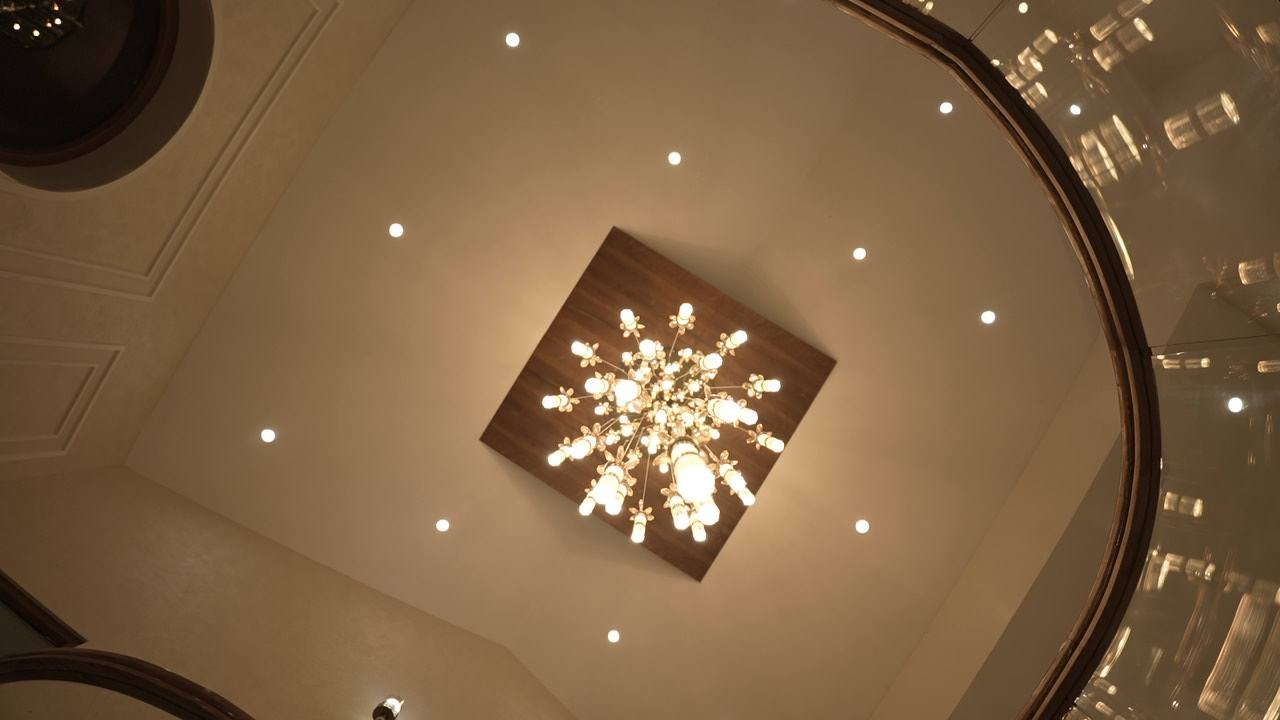 Crystal light set into a timber ceiling panel